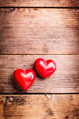 Red hearts on wood