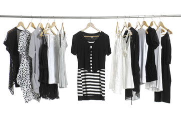 fashion female clothing hanging on hangers