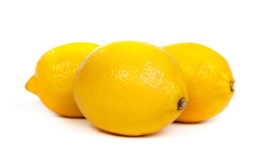Fresh lemons on white background