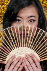 Woman with an Asian fan