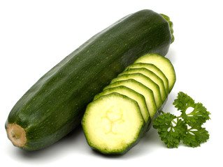 Two fresh vegetable zucchini isolated on white background.
