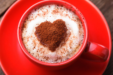 Red cup with cappuccino