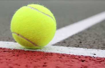 Tennis Ball on a court line