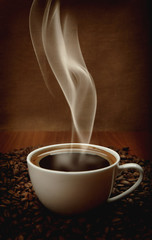cup of coffee with aromatic smoke