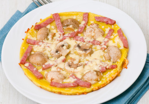 omelet with mushrooms, ham and cheese