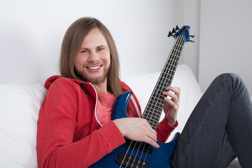 young guitarist playing guitar