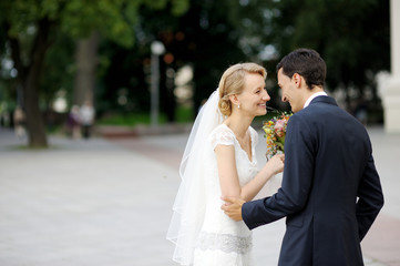 Bride and groom walking together
