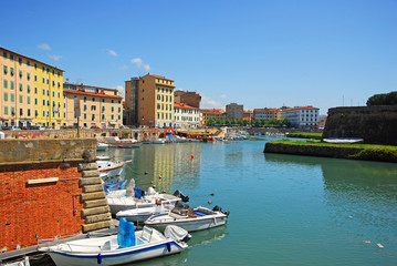 Italy, downtown Livorno, boats at Venice district - obrazy, fototapety, plakaty