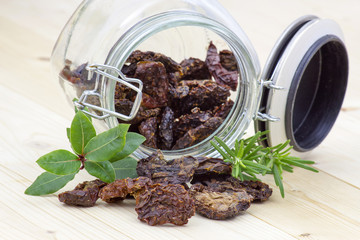 dried tomatoes in a jar