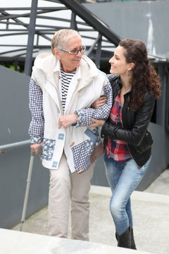 Girl Helping Older Lady