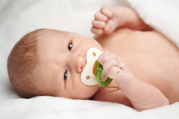 cute baby with nipple portrait