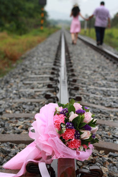 Pink beautiful flower wedding on railway