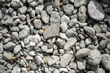 Pebble stone closeup on the shore