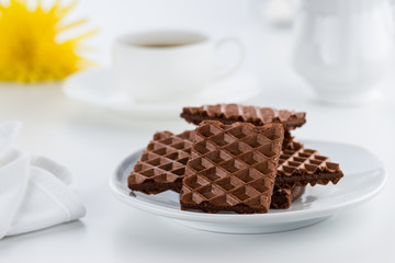 Cookies and coffee on the white table
