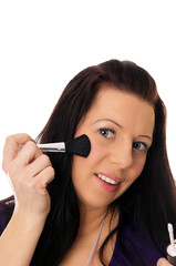 pretty woman with cosmetic brush