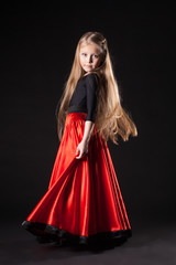 girl in oriental hispanic costume dance flamenco