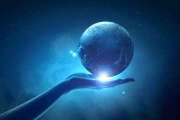 Image of earth planet on hand