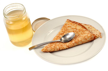 Pot de miel et crêpe au miel