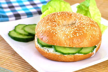 Bagel with cream cheese and cucumber