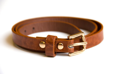 brown leather belt on a white background