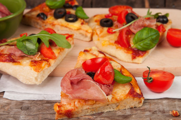 Pizza with ham, pepper and olives on old wooden background - obrazy, fototapety, plakaty