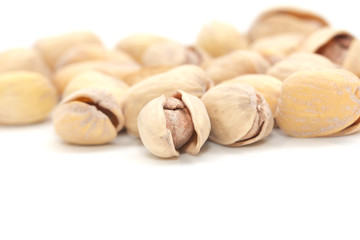 pistachios on a white background. macro