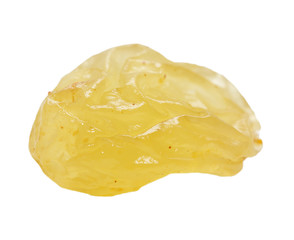 yellow raisins on a white background. macro
