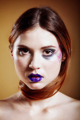 portrait of young beautiful woman creative make up