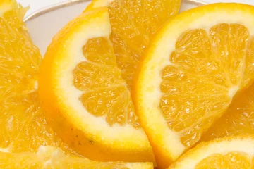 Fotobehang Plakjes fruit gesneden sinaasappel