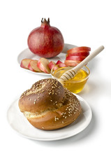 Still life - challah, apples, pomegranate and honey