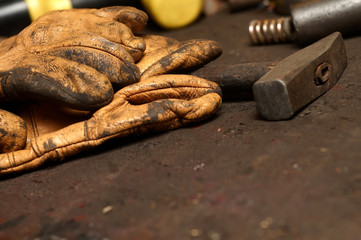 old gloves and hammer