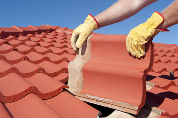 Construction worker tile house roofing repair