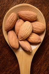 Almonds in a Wooden Spoon Close Up