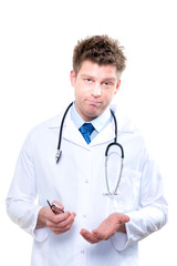 Expressive doctor with stethoscope. Isolated