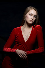 Pretty young woman portrait in red dress