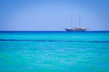 Fototapeta na wymiar sailing-ship in the azure sea