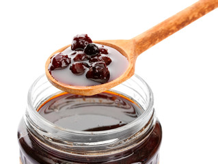 tasty berry jam, isolated on white