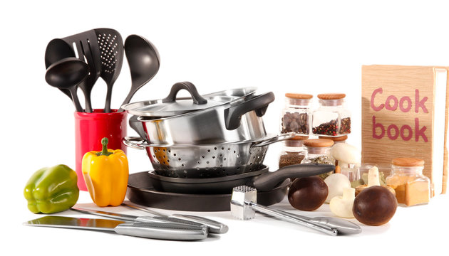 composition of kitchen tools,spices and vegetables isolated