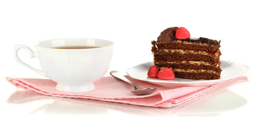 A cup of tea and delicious cake isolated on white