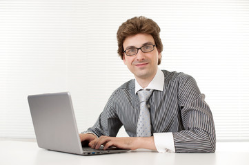 business man using a laptop - Indoor