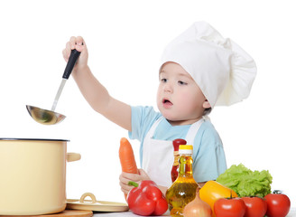 The little boy in a hat of the cook