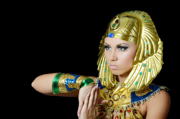 The girl-dancer in a costume of the Pharaoh