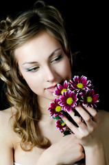 The girl with beautiful hair with chrysanthemum