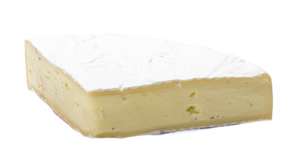 A piece of soft brie cheese
