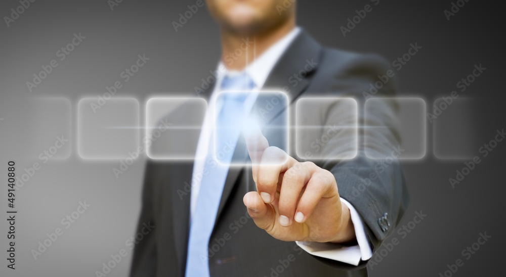 Wall mural businessman touching digital interface