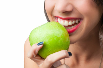 Biting a green apple