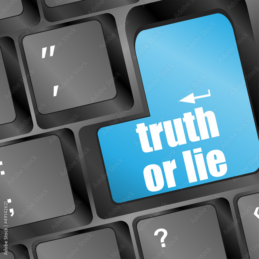 Poster wording truth or lie on computer keyboard