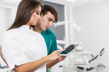 Dentists with tablet