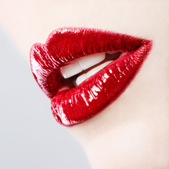Beautiful female with red shiny lips close up - 49146040