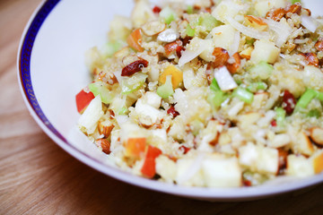 Quinoa salad with apples, goji berries, celery and almonds